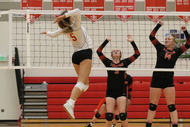 Hannah Ashley goes up for a kill during a match against Grinnell earlier this season. PHOTO BY BAILEY FREESTONE/DALLAS COUNTY NEWS