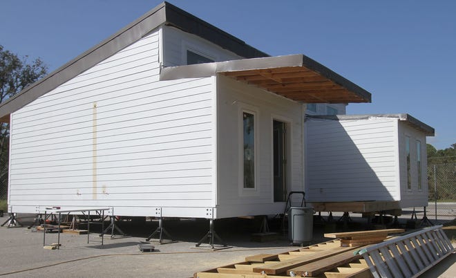 The Embry-Riddle Aeronautical University/Daytona State College energy efficient solar house that students from the two schools have been working on for a year had to be taken apart and reassembled in Denver for contest that will judge a host of qualities including architecture and energy efficiency. [News-Journal/David Tucker]