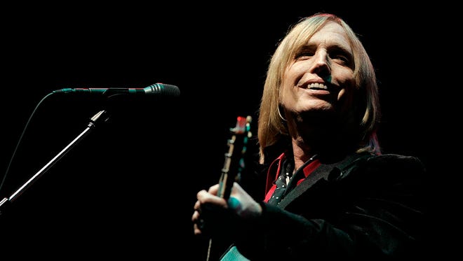 In this June 16, 2006 photo, Tom Petty performs at the Bonnaroo Music & Arts Festival in Manchester, Tenn. (Associated Press, file)