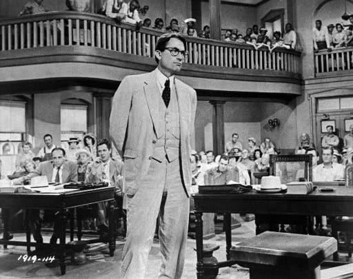 Gregory Peck is shown as attorney Atticus Finch in "To Kill a Mockingbird."
