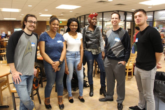 Northern Essex Community College students attend the first International Community Meet and Greet. Pictured, from left: Brett Davekos, of Beverly; Soleivy Silverio, a native of the Dominican Republic; Rose Bellahalea, a native of Cameroon; Ivy Ngugn, of Kenya; NECC Chemistry Professor Mike Cross; and Glen Gjuraj, of Albania. [Courtesy Photo]