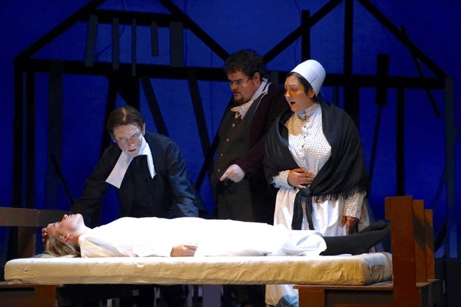 Alyssa Johnson (laying down), Josh Naujokas (from the left), Seth Klatt and Stacy Sammul practice a scene on Tuesday, Sept. 3, 2017, during dress rehearsal of the play, "The Crucible," in the Ferguson Fine Arts Center at Highland Community College in Freeport. [SUSAN MORAN/THE JOURNAL-STANDARD CORRESPONDENT]