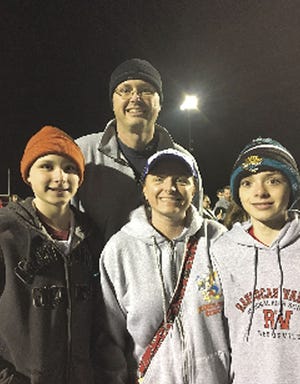 Brendan (left) and his family (from left) parents Dan and Maureen and brother Danny attend a previous year's Relay for Life at Rancocas Valley Regional High School.