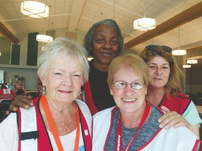 Kathy Yaste of Colchester received a letter of commendation on Sept. 23 from American Red Cross Deputy District Director Sara Hicks-West in Jacksonville, Fla. Front, from left are Carol Kahn and Yaste. Kahn is from Michigan. In back, from left, are Team Leader Anita Grant from West Virginia and Kathy Bracket from New Hampshire.