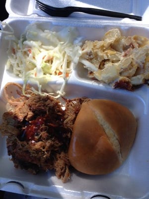 The pulled pork sandwich with sweet vinegar coleslaw and cheesy potatoes from Twyford's BBQ Food Truck.