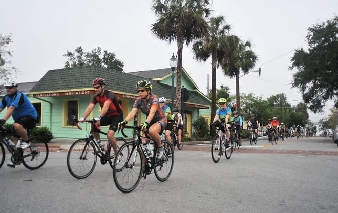 Riders leave for a ride on Friday during the 43rd annual Mount Dora Bicycle Festival. [TOM BENITEZ / CORRESPONDENT]