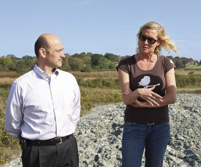 Middletown Finance Director Marc Tanguay and Norman Bird Sanctuary Executive Director Natasha Harrison discuss the progress and success of resiliency projects on Thursday near Third Beach in Middletown.
