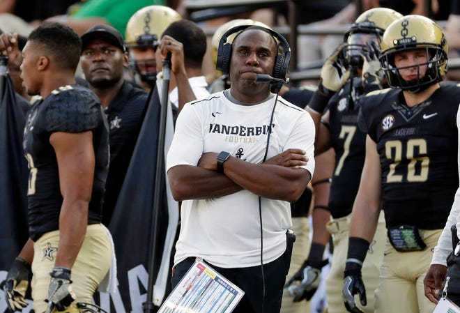 FILE - In this Sept. 23, 2017, file photo, Vanderbilt head coach Derek Mason watches from the sideline during a 59-0 loss to Alabama on Sept. 23 in Nashville, Tenn. (Mark Humphrey/AP File Photo)