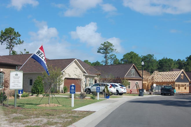 Newly built homes and other under construction at the Village at Motts Landing. The active adult community is planning to expand its footprint off Sanders Road. [CAMMIE BELLAMY/STARNEWS]