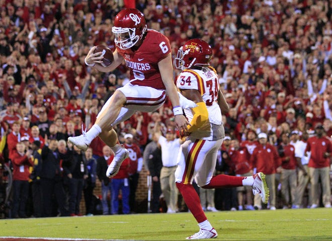 Oklahoma quarterback Baker Mayfield (6) leaps in for a touchdown against Iowa State during the first quarter in Norman, Okla., on Nov. 7, 2015. [AP Photo/Alonzo Adams, File]