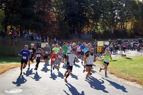 The Ladybug 5K and Kids Fun Run will take place on Saturday, Oct. 14 from the John F. Kennedy Elementary School in Franklin. Pictured: Runners participate in a past Ladybug event. [COURTESY PHOTO]