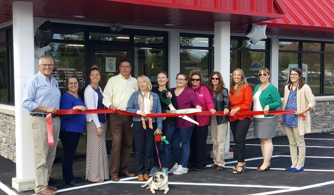 On Wednesday, the Greater Somersworth Chamber of Commerce and the Greater Dover Chamber of Commerce held a joint ribbon cutting ceremony to celebrate the expansion of Somersworth Storage at 240 Route 108. [Judi Currie/Fosters.com]