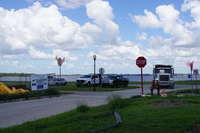 Construction trucks, shown here, are already a common site at the Clermont boat ramp, soon to be turned into a construction area when the boat ramp closes on Dec. 17. [LINDA CHARLTON / CORRESPONDENT]