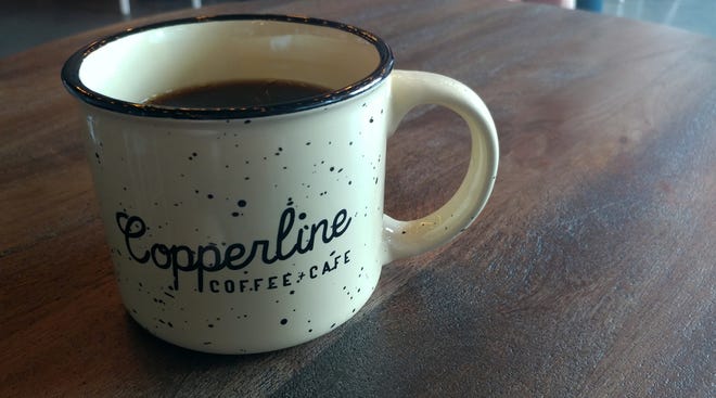 Copperline Coffe + Cafe at the Port Orange Pavilion is home to delicious fried chicken biscuits, waffles and craft coffee. The new cafe also has some great decor that embraces the owner's Tennessee roots. [News-Journal/Allison Shirk].