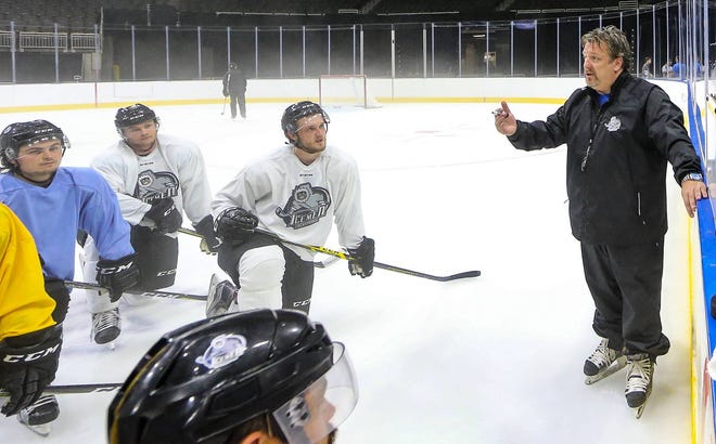 Team listens to head coach Jason Christie, right, during media day for the newly formed professional hockey team, the Jacksonville Icemen, at the Veterans Memorial Arena in Jacksonville, Fla., Tuesday, Oct. 10, 2017. (For The Florida Times-Union, Gary Lloyd McCullough)