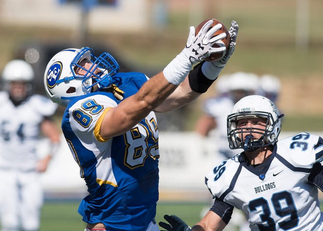 Southeastern Oklahoma State tight end Codey McElroy catches a pass this season. McElory walked on the team in late August after previously playing professional baseball and walking on the Oklahoma State basketball team. [PHOTO PROVIDED BY SOUTHEASTERN]
