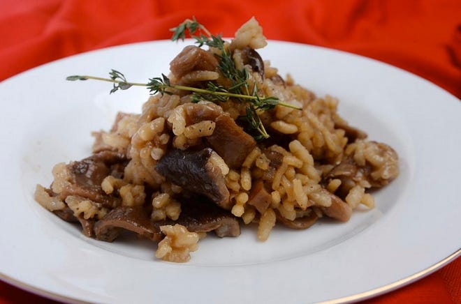 Wild mushroom risotto uses oyster mushrooms. [Greg Wohlford/Erie Times-News]