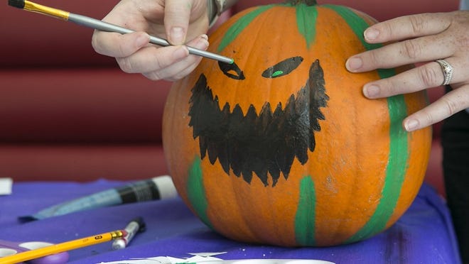 Make a festive pumpkin that will last till Halloween. RALPH BARRERA/AMERICAN-STATESMAN PHOTOS