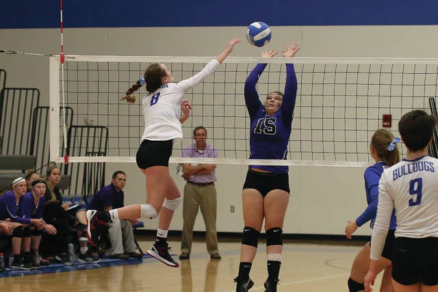 Sophie Volk hits the ball over the net during the game against West Central Valley on Oct. 12. Volk was the leader in kills for the Bulldogs. PHOTO BY BAILEY FREESTONE/DALLAS COUNTY NEWS