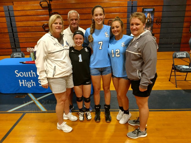 South Lenoir's seniors, Amber Parker (1), Hunter West (7) and Lauren Jones helped the Blue Devils defeat North Lenoir Thursday in the team's season finale. Standing next to the seniors are, from left, Blue Devils coach Lisa Smith and assistant coaches Thurman Pate and Mishella Craine. [Photo by Junious Smith III / The Free Press]