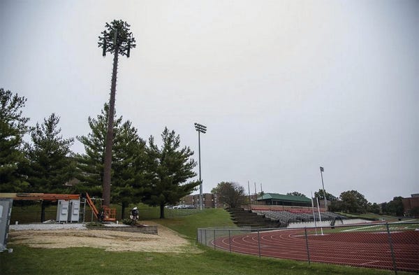 A U.S. Cellular cell tower stands under construction near the Monmouth College football field. The plan is to decorate the tower with branches to make it look like a standing pine tree.