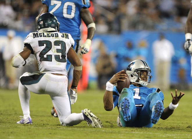 Carolina Panthers quarterback Cam Newton reacts after being hit by Eagles defender Rodney McLeod in the second half of Thursday's game in Charlotte, North Carolina.