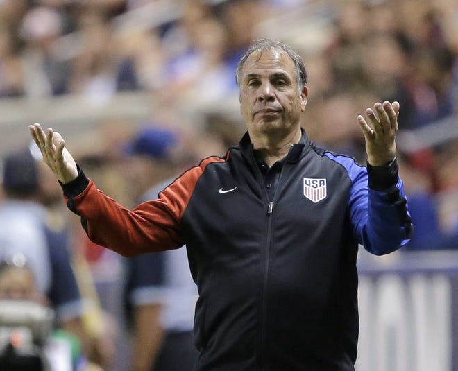 U.S. coach Bruce Arena reacts on the sideline during the second half of the team's international friendly soccer match against Venezuela on June 3 in Sandy, Utah. Arena has resigned in the wake of the teams U.S. national team's crash out of contention for the 2018 World Cup. [AP Photo / Rick Bowmer]