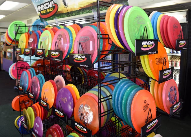 The pro shop at New World Sports has a colorful variety of discs. Newcomer and Hart will host the Disc Golf Pro Tour Championship, which will bring in top players in the men’s and women’s divisions of the tour. The four-day event starts Thursday. (Bruce Lipsky/Florida Times-Union)