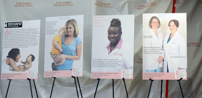 Photos of Women Healthcare providers and centers for women's health are displayed at the Eugenia Casey Briley Women's Health Series on Thursday at UNC Lenoir Health Care. [Janet S. Carter / The Free Press]