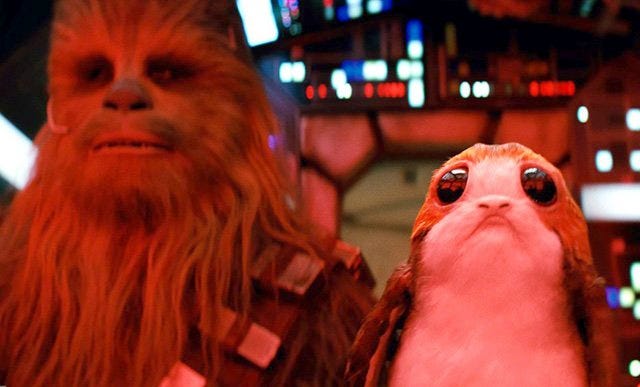 "The Last Jedi" introduces the porg (right), with Chewbacca. [Disney-Lucasfilm]