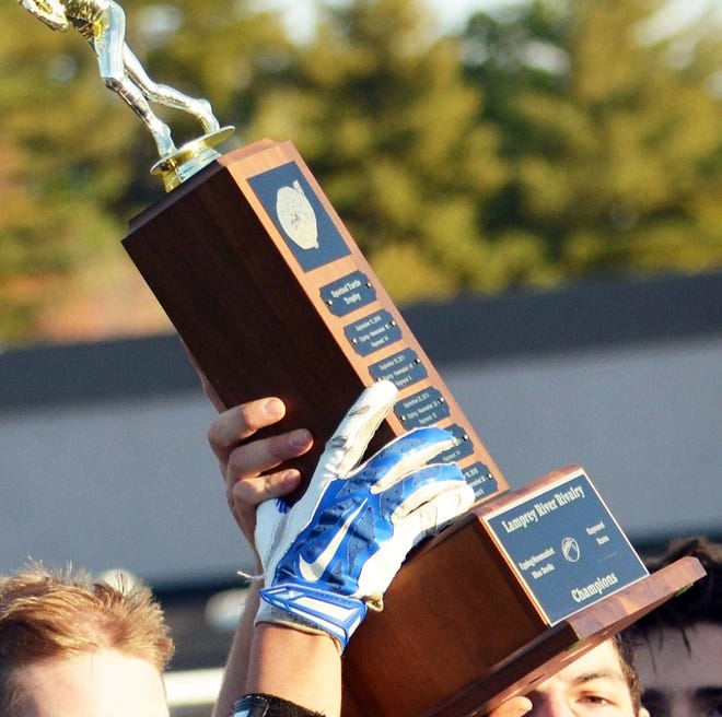 The Epping-Newmarket football team is now 7-0 all time in its rivalry series against neighboring Raymond. That means the Blue Devils have never relinquished the Spotted Turtle Trophy. [seacoastonline, file]