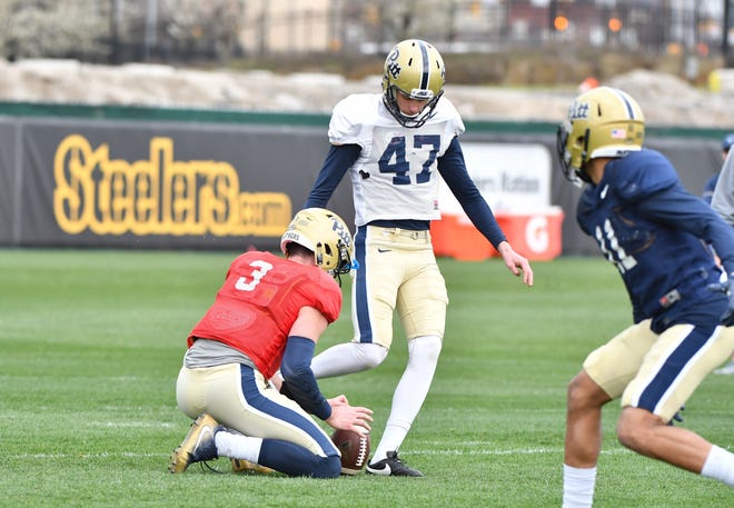 Former Portsmouth High School soccer standout Ian Troost (47) practices place-kicking during spring practice at the University of Pittsburgh earlier this year. [Pitt Athletics Media Relations]