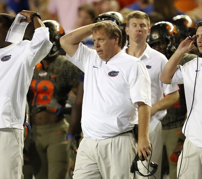 Florida coach Jim McElwain reacts during the Gators' loss to Texas A&M on Saturday at Ben Hill Griffin Stadium. [Brad McClenny/Staff photographer]