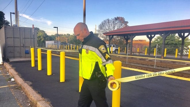 Beverly Police closed down the northbound tracks at Beverly Depot after a man was struck and killed by an MBTA commuter rail train on Friday morning, Sept. 1. [WCVB photo / Stan Forman]