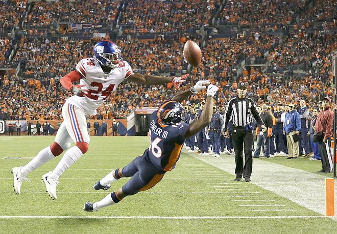 Denver Broncos wide receiver Bennie Fowler (right) can't make the end zone catch as New York Giants cornerback Eli Apple (24) defends during the first half of Sunday's game in Denver.      

[Jack Dempsey / Associated Press]