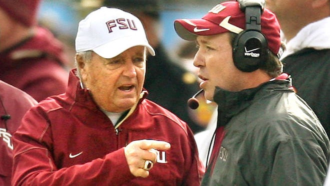 Former Florida State coach Bobby Bowden talks with offensive coordinator Jimbo Fisher during the 2010 TaxSlayer Bowl game at Everbank Field, the final game in Bowden’s coaching career. Fisher may bring the Seminoles back to Jacksonville for this year’s TaxSlayer Bowl if FSU can win four of its last six games. (File).