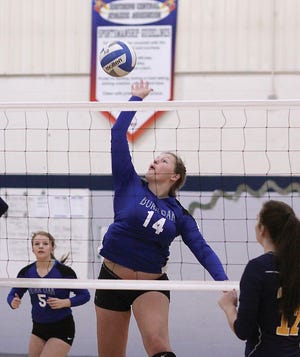 Burr Oak’s Ivy Eells record a kill in the first of two matches with Marshall Academy Monday night.