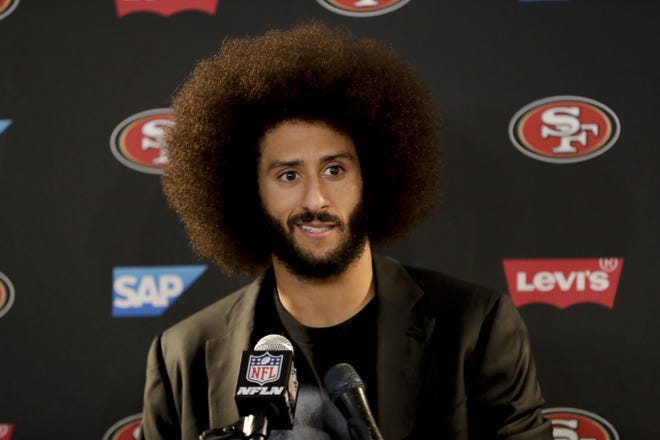 Former San Francisco 49ers quarterback Colin Kaepernick filed a grievance against the NFL on Sunday alleging that he remains unsigned as a result of collusion by owners following his protests during the national anthem. [AP File Photo/Rick Scuteri]