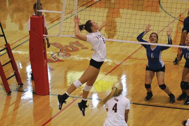 Sami Schepers goes up for a kill during a game earlier this year. Schepers led the Tigers against the Bluejays on Oct. 12. PHOTO BY BAILEY FREESTONE/DALLAS COUNTY NEWS