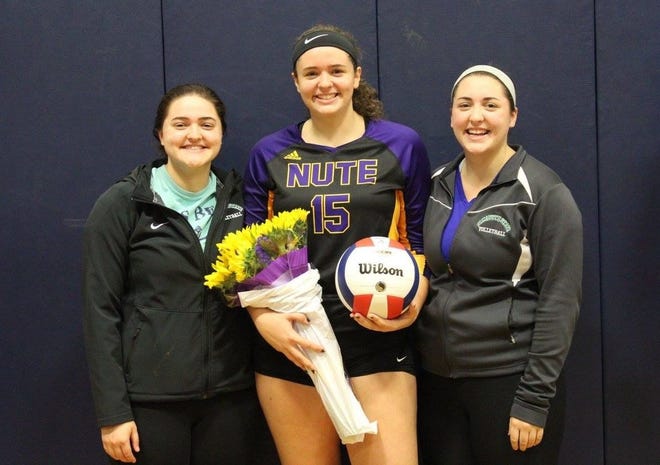 Nute High School junior Emilee Flanagan, center, picked up her 500th career volleyball kill last Friday at Franklin. She joined company with her sisters, Nikki, left, and Alisha, both members of Nute's 500-kill club. [Courtesy photo]