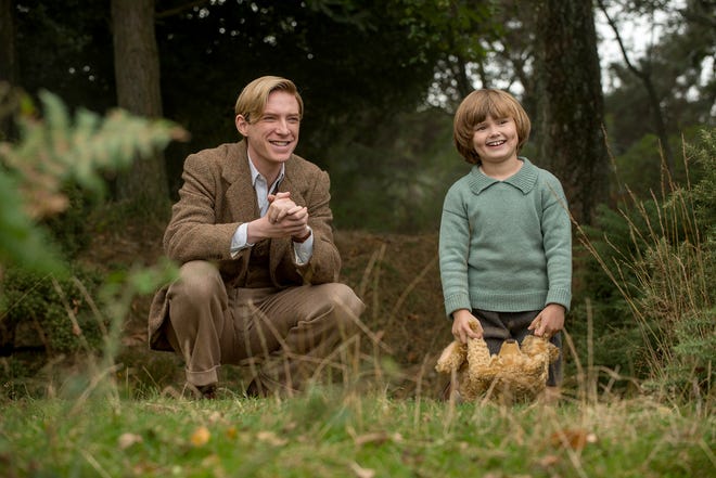 Domhnall Gleeson, left, plays "Winnie-the-Pooh" author A.A. Milne, whose son (Will Tilston) inspired the character of Christopher Robin, in the biopic "Goodbye Christopher Robin." [David Appleby/Fox Searchlight Pictures]