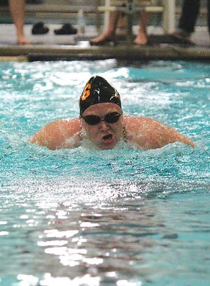 Kenzie Cain of Sturgis swims the butterfly portion of the 200 medley relay on Tuesday for the Lady Trojans.