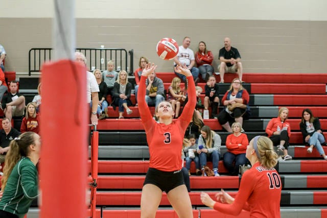 Gilbert’s Bree Richard sets to Inga Rotto in the Tigers’ three-set victory against Saydel in the first round of the Class 3A regional tournament on Wednesday in Gilbert. Photo by Debbie Gray/Special to the Tribune