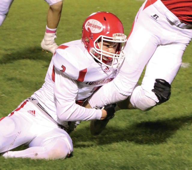 Boone defensive back Quali Sporaa drags down a Dallas Center-Grimes ball carrier last week. Sporaa, a sophomore, has made 14 solo tackles and two interceptions this season. Photo by Andrew Logue/News-Republican