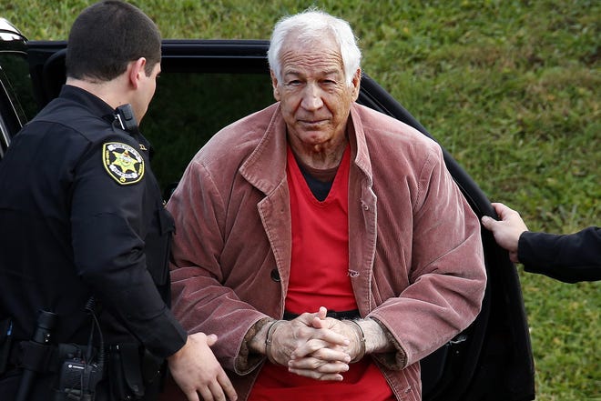 FILE - In this Oct. 29, 2015, file photo, former Penn State University assistant football coach Jerry Sandusky arrives for an appeal hearing at the Centre County Courthouse in Bellefonte, Pa. Sandusky lost a bid Wednesday, Oct. 18, 2017, for a new trial and a second chance to convince a jury he is innocent of the child sexual abuse charges that landed him in state prison to serve a lengthy sentence. (AP Photo/Gene J. Puskar, File)