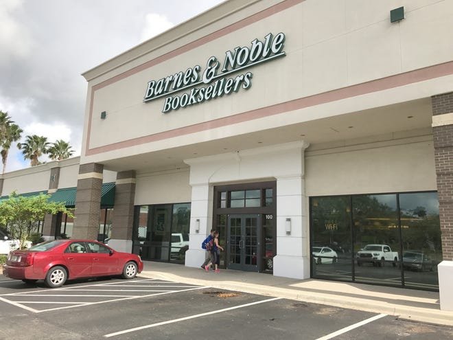 Customers walk into the Barnes & Noble store on International Speedway Boulevard in Daytona Beach on Monday, Oct. 16, 2017. The bookstore, which was set to close at year's end, has renewed its lease for another year. [News-Journal//Clayton Park]