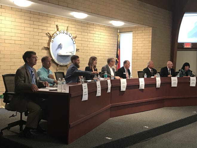 The Swansboro mayoral and Board of Commissioners candidates prepare to begin answering questions at the candidate forum. [Amanda Thames/The Daily News]