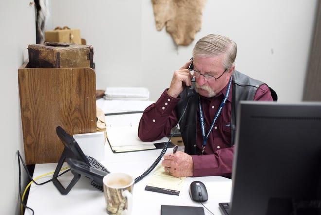 Investigator Jim Parks pursues new leads on cold cases in his office at the Norman Investigations Center. [PHOTO BY WHITNEY BRYEN, FOR THE OKLAHOMAN]