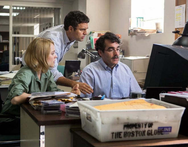 FILE PHOTO - This photo provided by courtesy of Open Road Films shows, Rachel McAdams, from left, as Sacha Pfeiffer, Mark Ruffalo as Michael Rezendes and Brian d’Arcy James as Matt Carroll, in a scene from the film, "Spotlight."