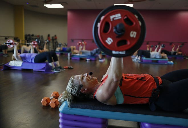 Crystal Sunkle leads a Les Mils BODYPUMP class at Mount Carmel Fitness and Health in Lewis Center, Ohio on August 18, 2017. [Kyle Robertson/The Columbus Dispatch]